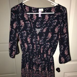 Francesca’s Navy Blue Floral Romper